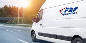 courier van driving on the road with an FRF logo o
